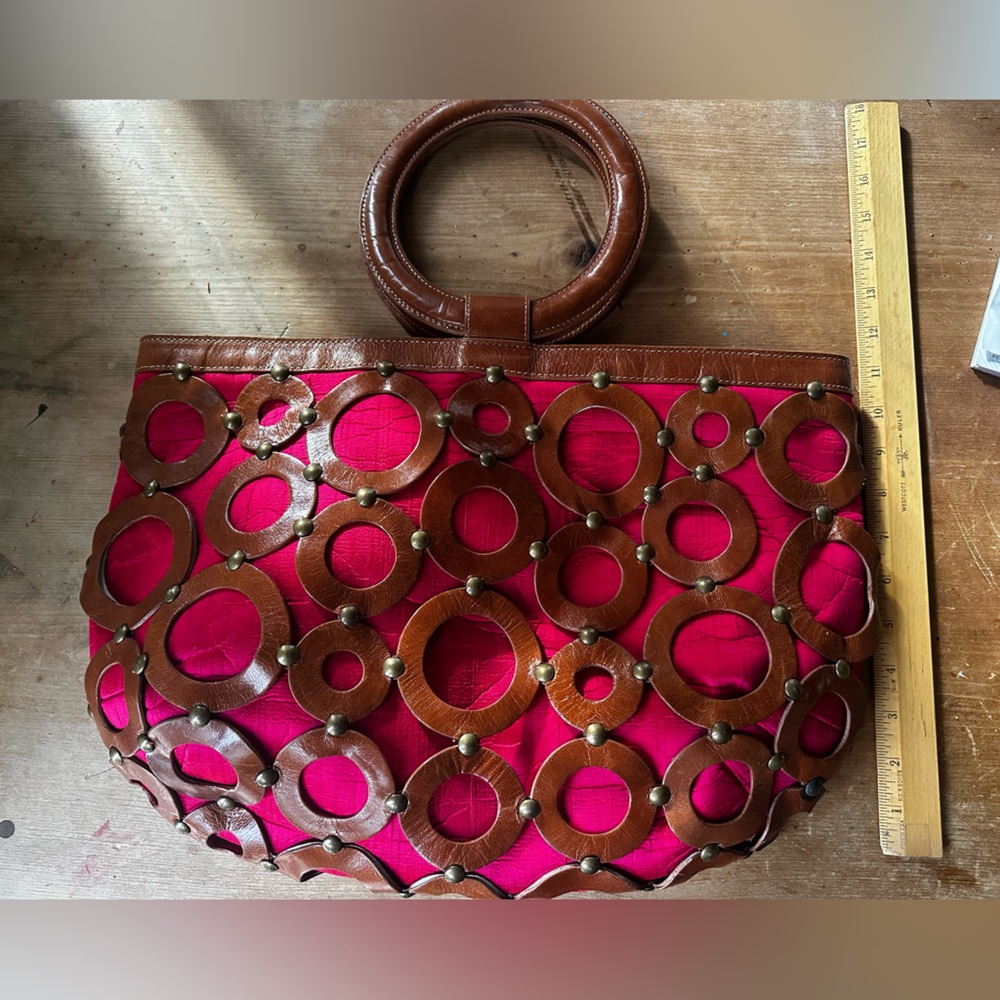 Inge Sport brown leather and fuschia raw silk purse.